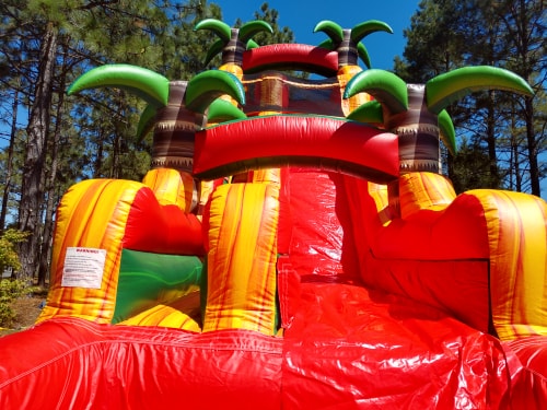 Rent the Tropical Fiesta 22 foot tall water slide from Carolina Fun Factory for your next event